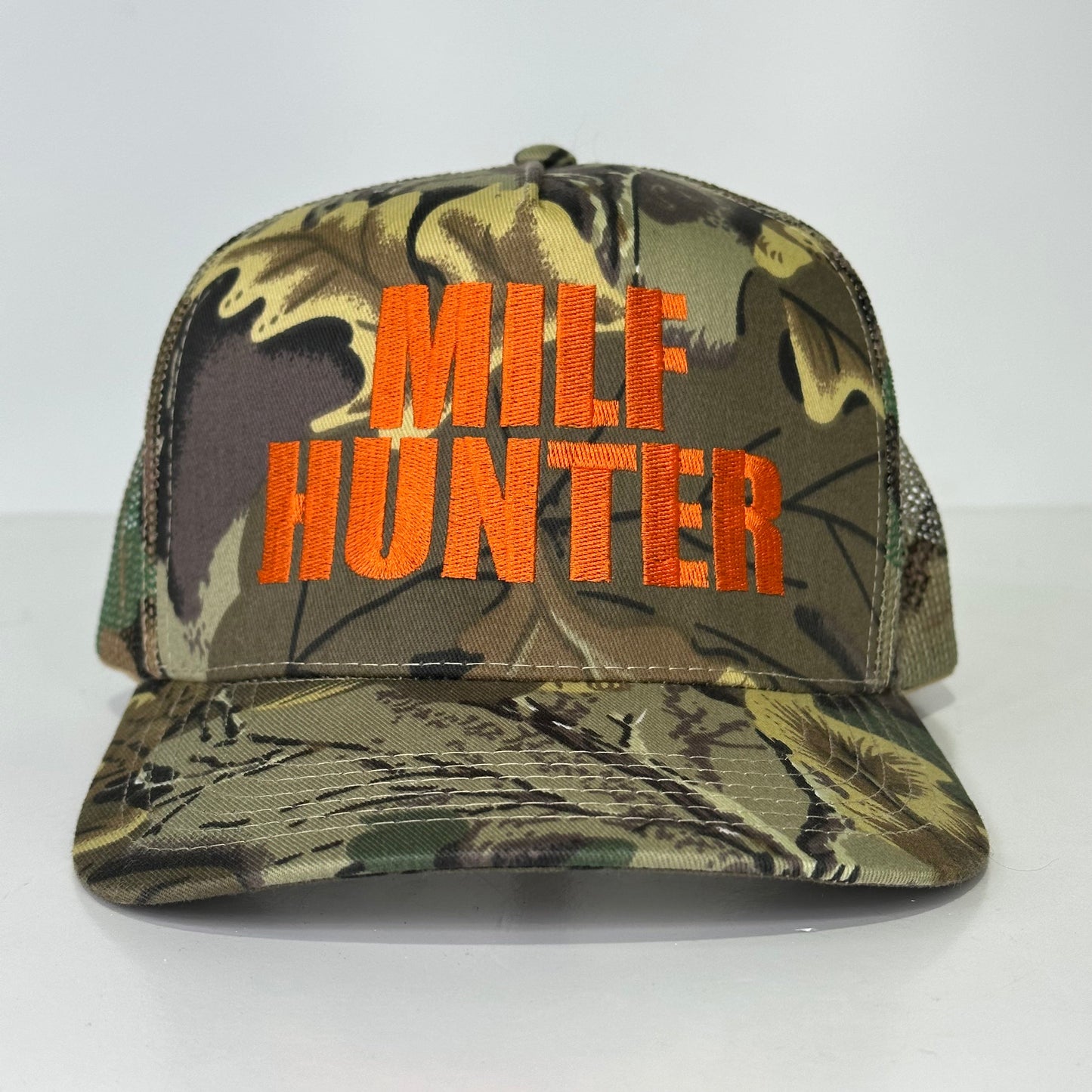 MILF hunter embroidered on a camo snapback hat