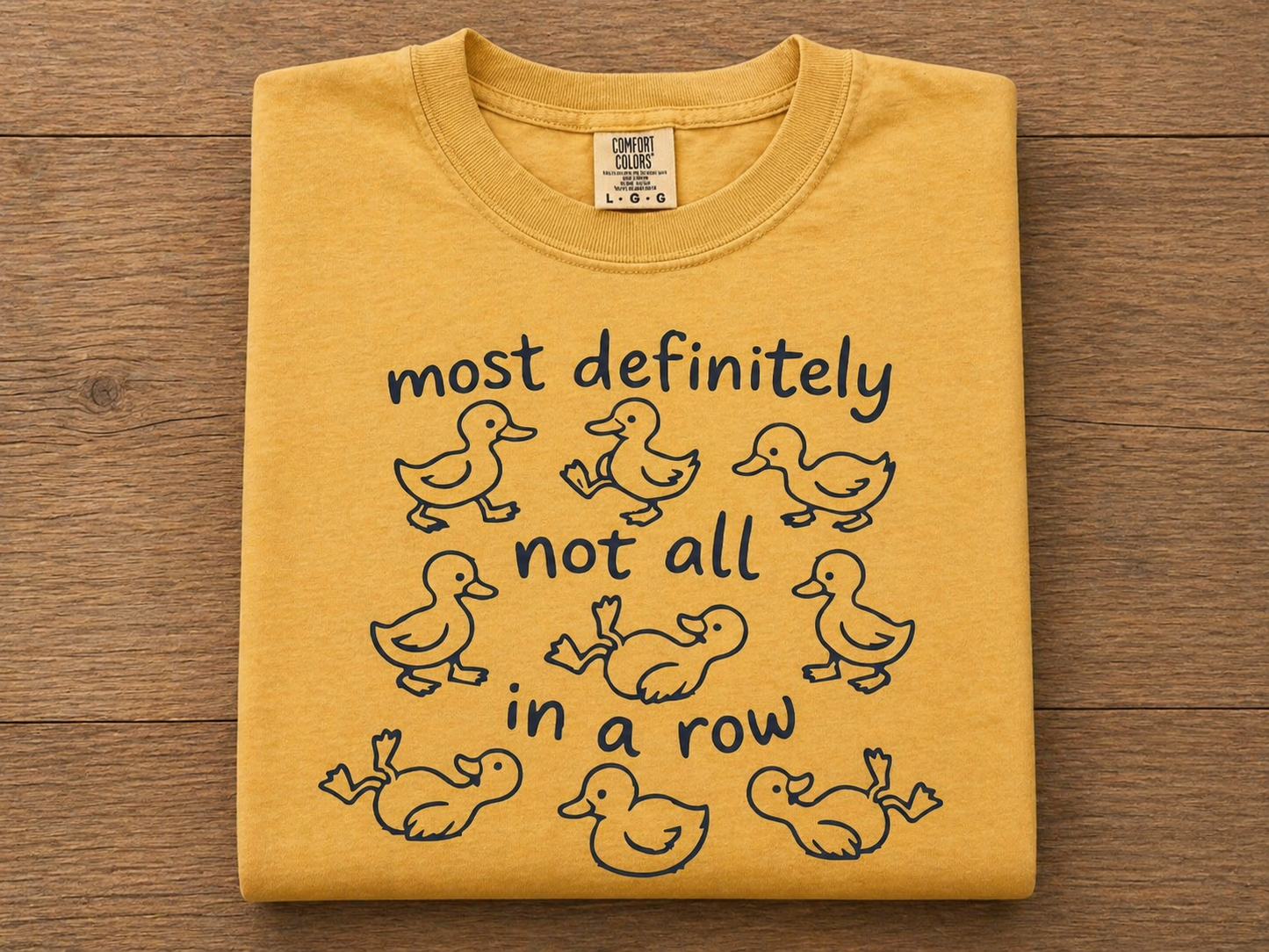 Most definitely not all in a row ducks, comfort colors T-shirt