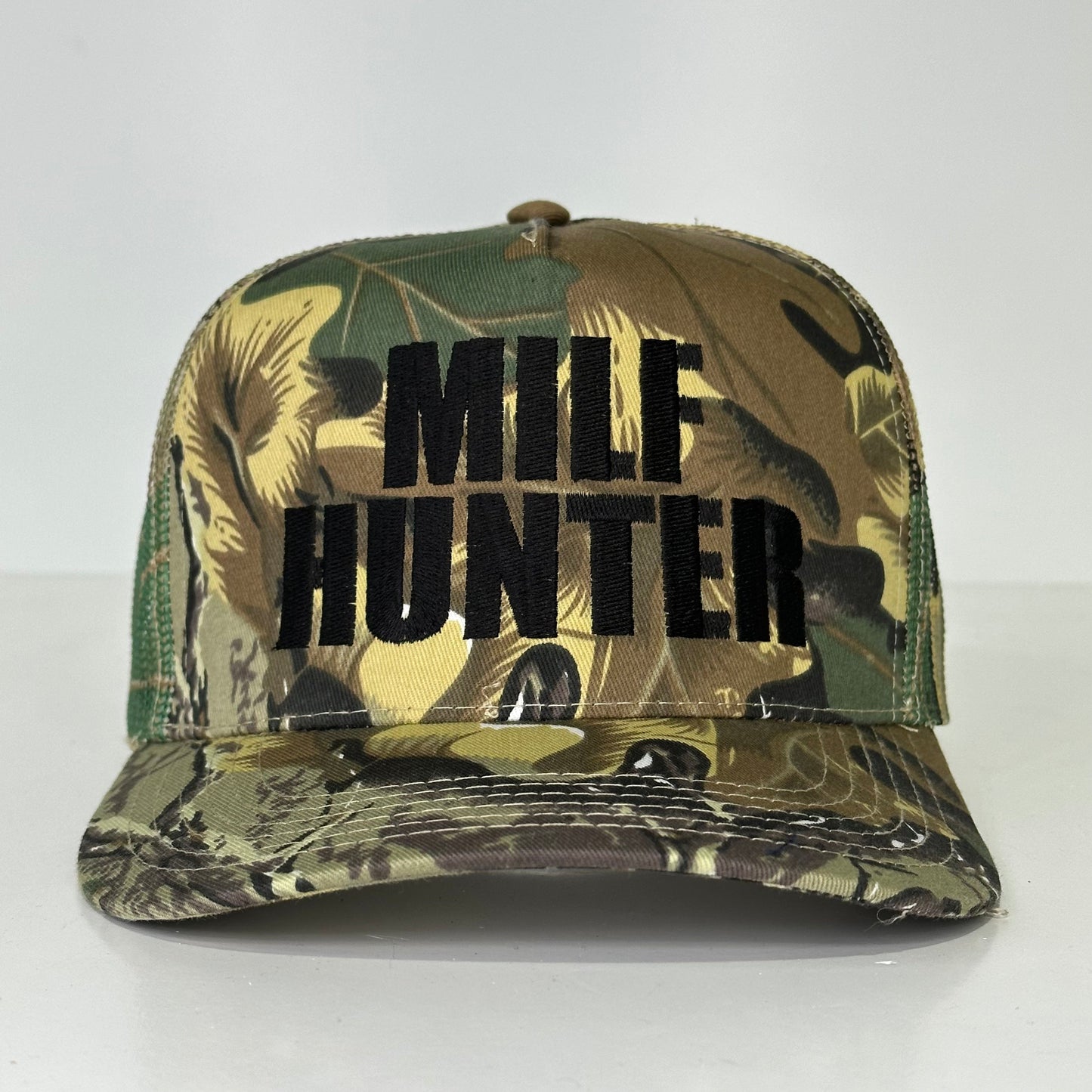 MILF hunter embroidered on a camo snapback hat